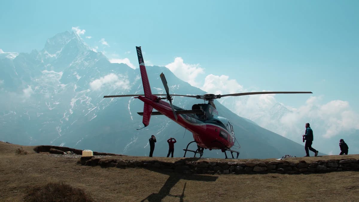 Mt. Thamserku and Helicopter